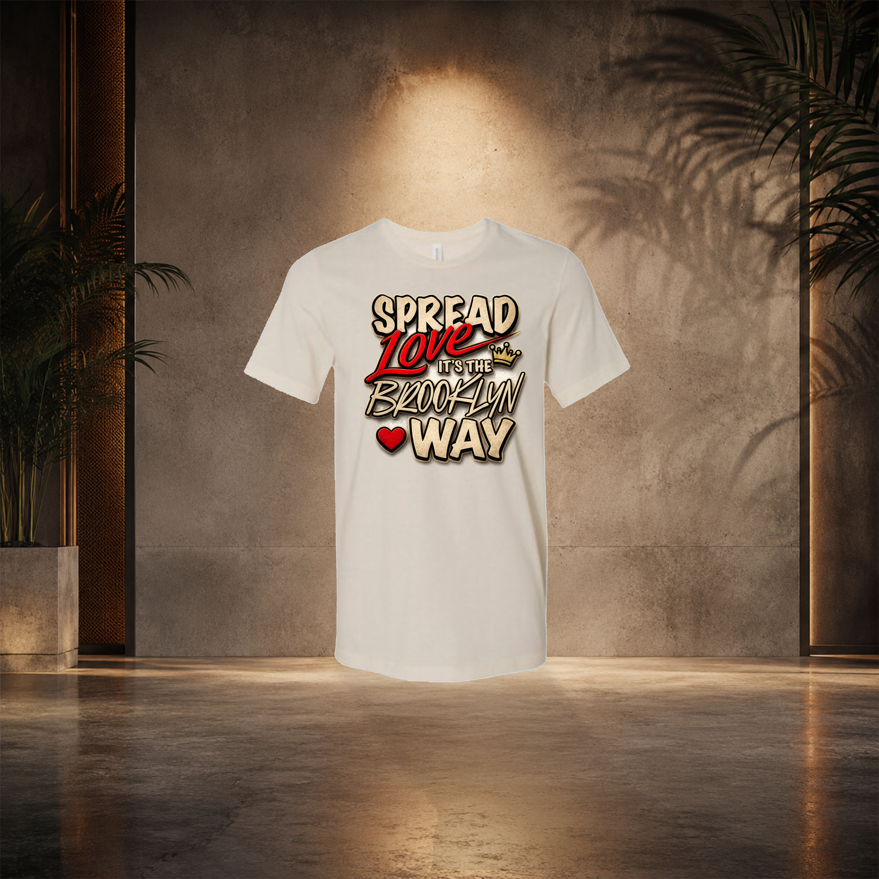 Cream Brooklyn t-shirt with colorful graphic text and heart design on a neutral background