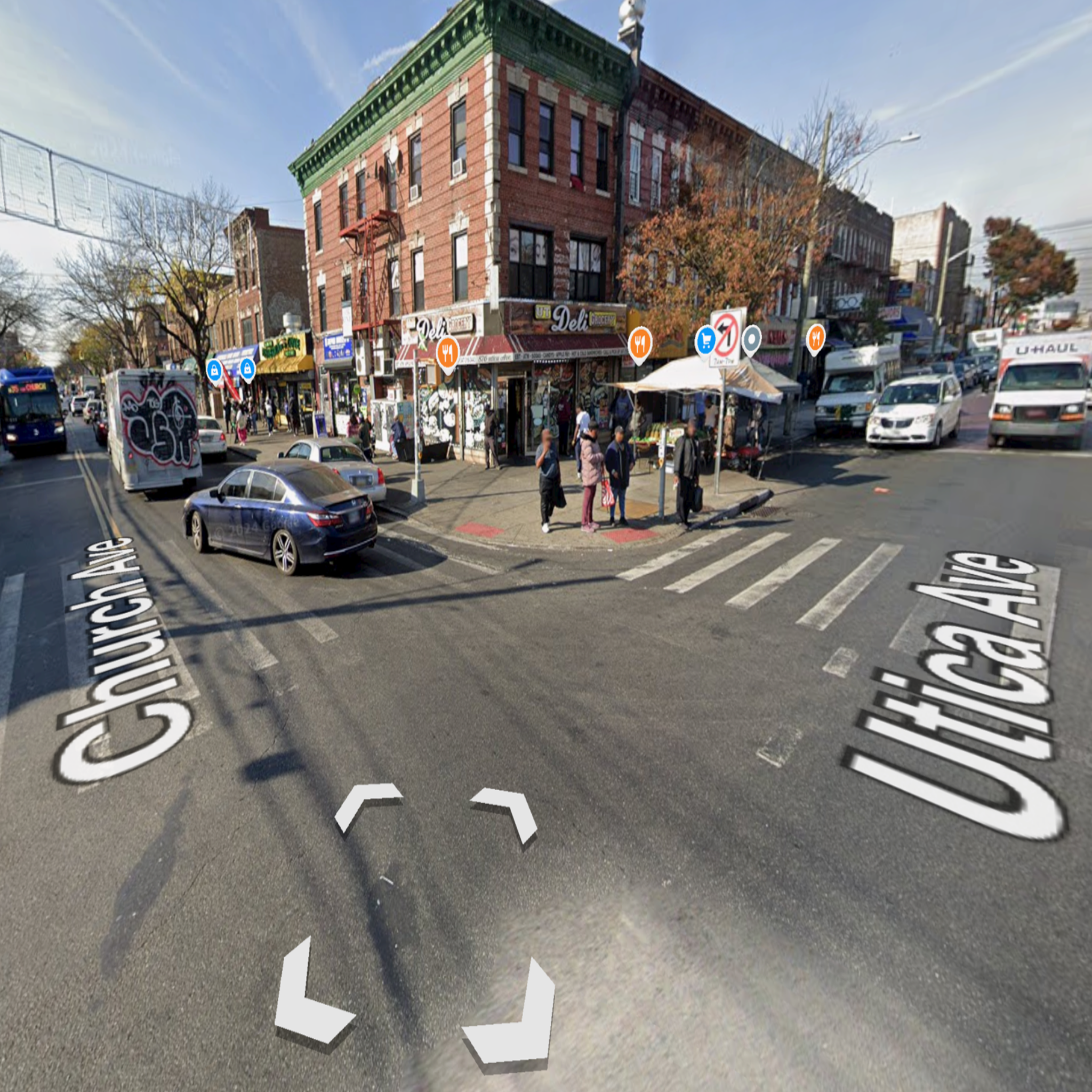 Street view of a city intersection with buildings, cars, and pedestrians at Church and Utica Avenues.